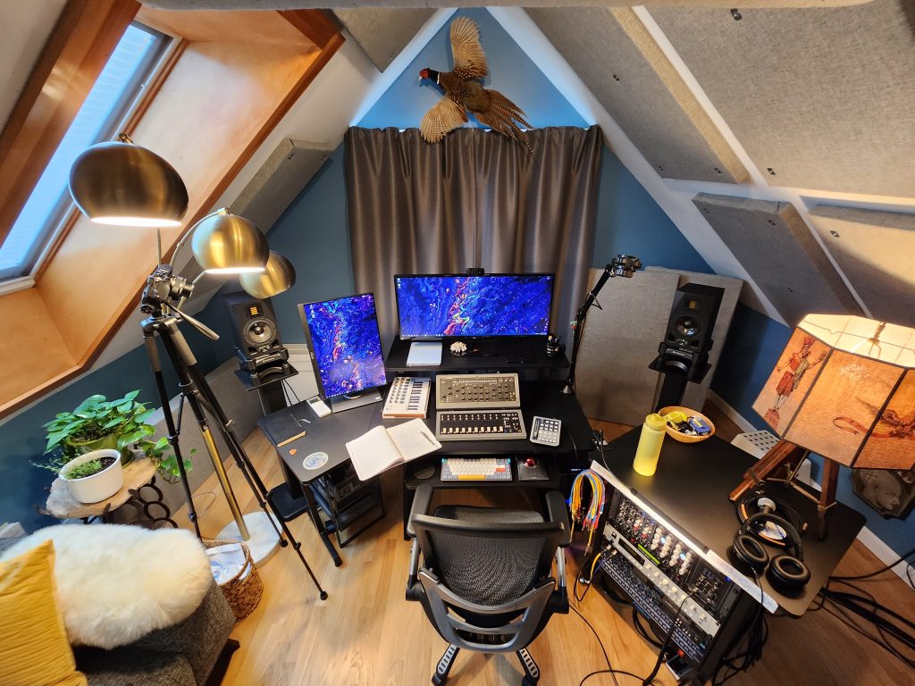 View of the computer side of my recording studio, with outboard gear